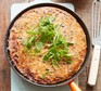 A black bean tortilla in a frying pan