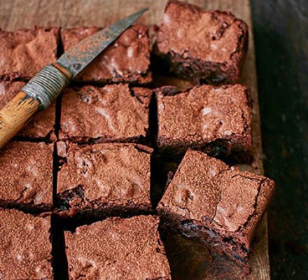 Bourbon, black cherry & bacon brownies Bourbon, black cherry & bacon brownies cut into squares