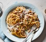 A single portion of bucatini with mushrooms & sausage