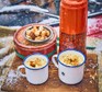 Cheesy cauliflower flask soup and two mugs