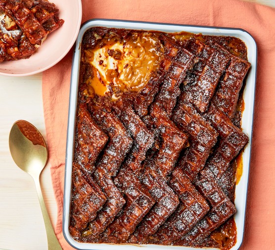 Chocolate and caramel waffle bread and butter pudding Chocolate and caramel waffle bread and butter pudding served in a baking dish