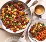Corned beef hash in pan and on plate with beans