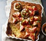 Fig sponge pudding served in a baking dish