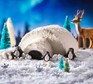 Igloo cake with fondant icing penguins