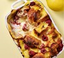 Lemon & raspberry doughnut pudding served in a baking dish