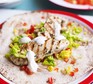 Lemon & yogurt chicken served on a flatbread