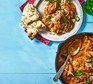 Old Delhi-style butter chicken in a pan and served on a plate