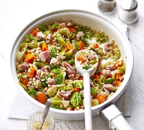Storecupboard one-pot recipes Pearl barley, leek and bacon casserole one-pot with a wooden spoon