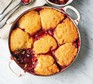 Plum & apple cobbler in a serving dish