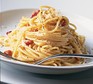 Close up of perfect spaghetti carbonara on a plate ready to eat
