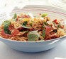 Bowl of Mediterranean tomato and basil pasta salad