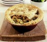 Chicken & leek pie on a board