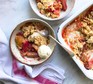 Rhubarb & apple crumble served in bowls with ice cream