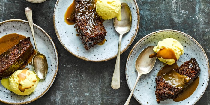 slow-cooker-stp Slow cooker sticky toffee pudding on plates with ice cream