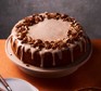 Spiced apple cider cake on a cake stand
