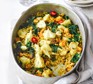 Spicy cauliflower & halloumi rice in a large oven dish