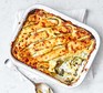A spinach & courgette lasagne in a casserole dish