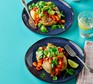 A jacket potato topped with three-bean chilli