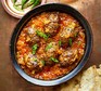 A casserole dish serving venison kofta